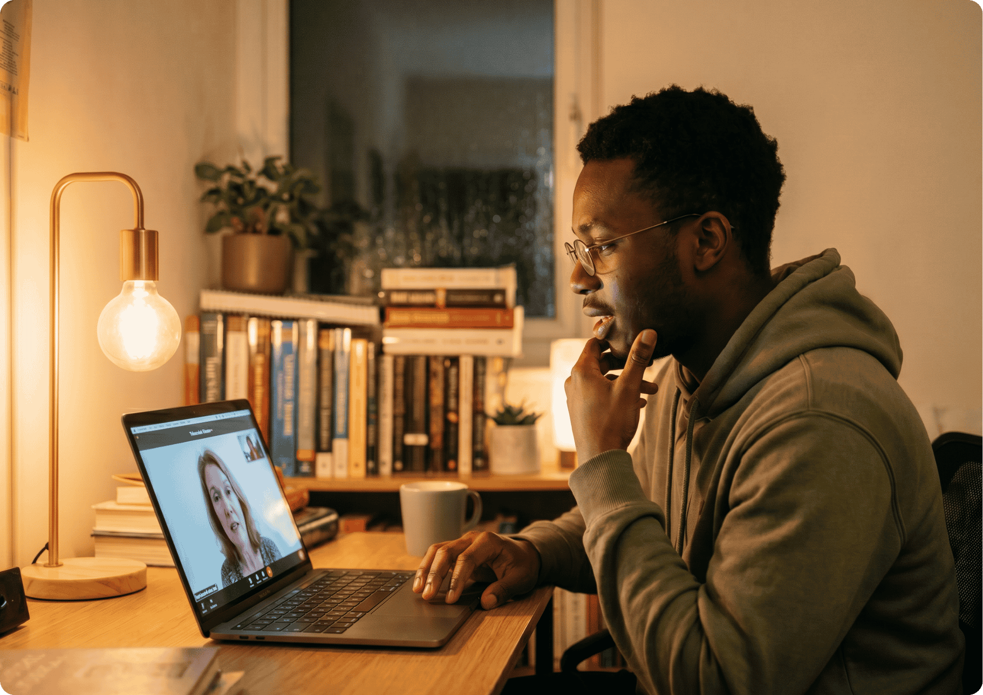 Person on laptop for telehealth psychology appointment, Mind-Care serving Armidale and New England NSW